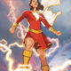 Cover for The New Champion of Shazam #1 showing Shazam standing on a field with lightning around her.